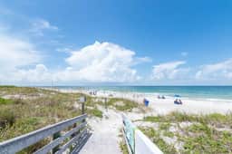 Escape the Winter to Spanish Villa #54! Across from Beach Access! New Management!
