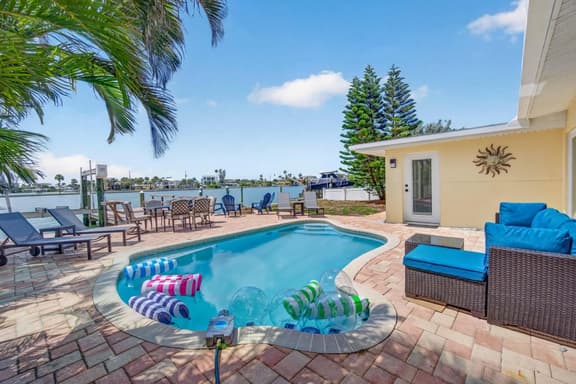 Beautiful Waterfront House with Pool & Dock Access! Close to Beach & Restaurants!